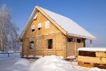 Дом из оцилиндрованного бревна с двойными стенами